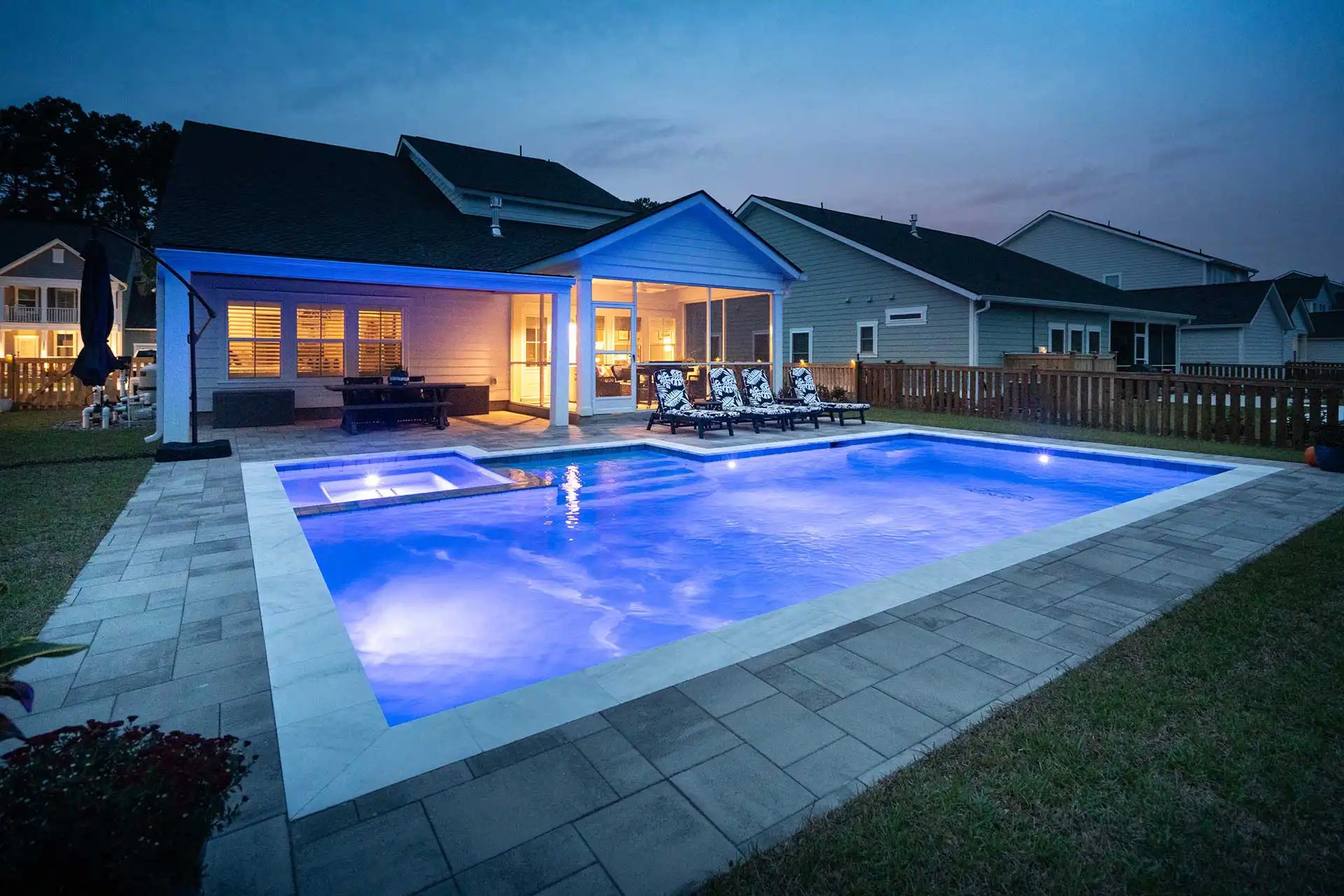 Blue-hour pool and spa — Heritage Pools project