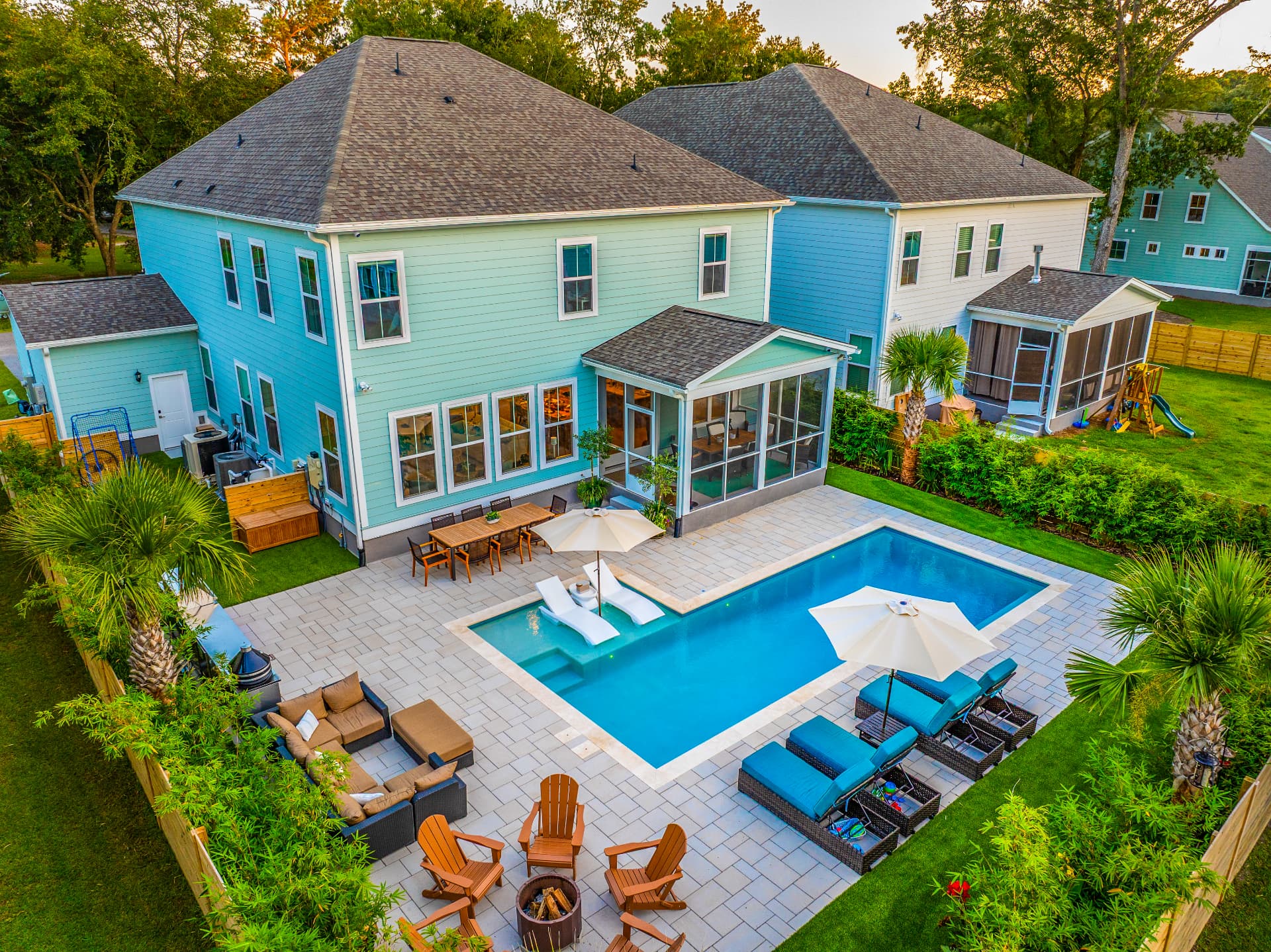 Family backyard with sun shelf — Heritage Pools project