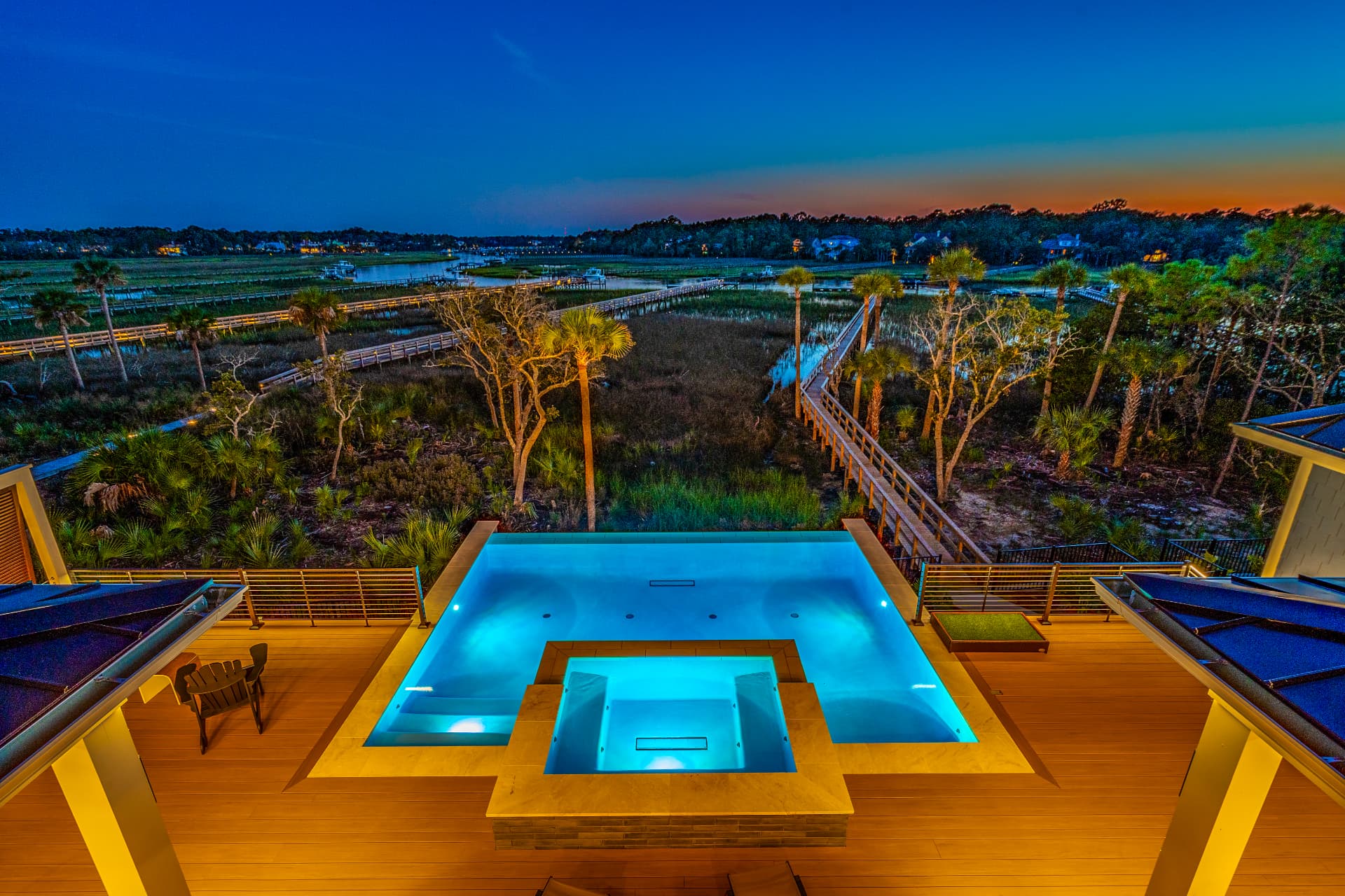 Marsh-front infinity edge — Heritage Pools project