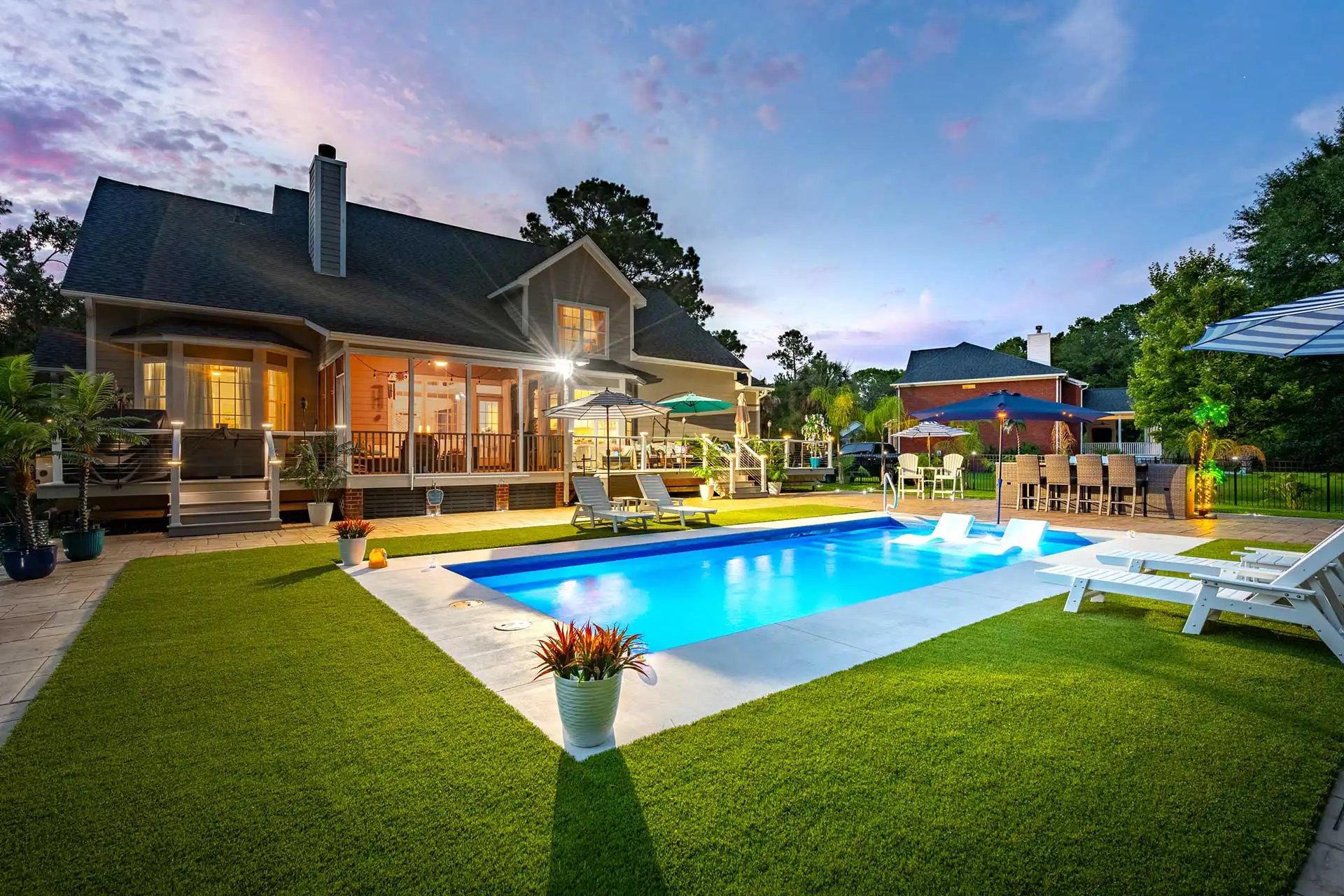 Fiberglass pool at dusk — Heritage Pools project